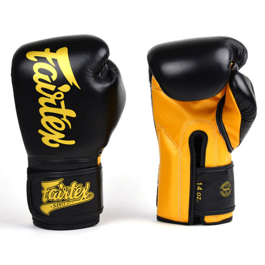 قفازات الملاكمة Fairtex Super Sparring باللونين الأسود والذهبي